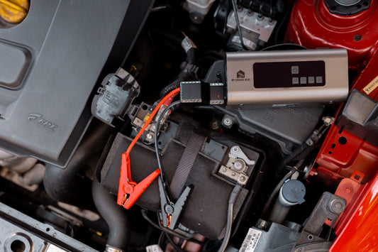 The Boost N' Inflate on top of a engine bay