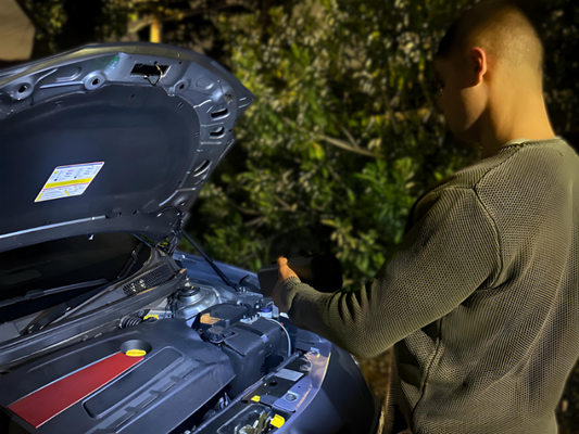 The Boost N' Inflate SOS light being used to light up an engine bay at night