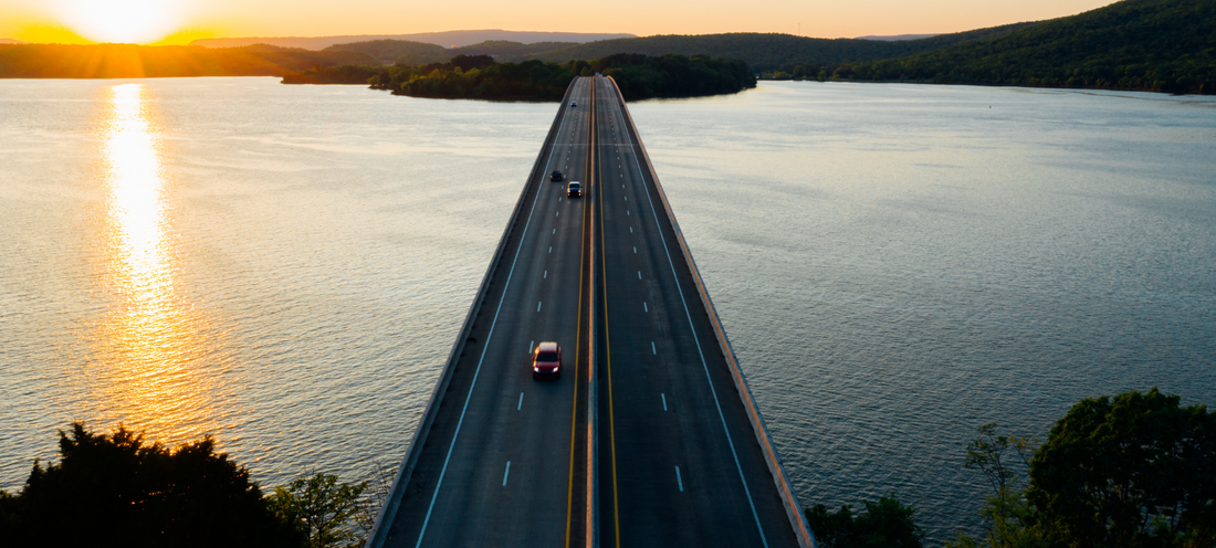 picturesque highway bridge over water on a sunset 