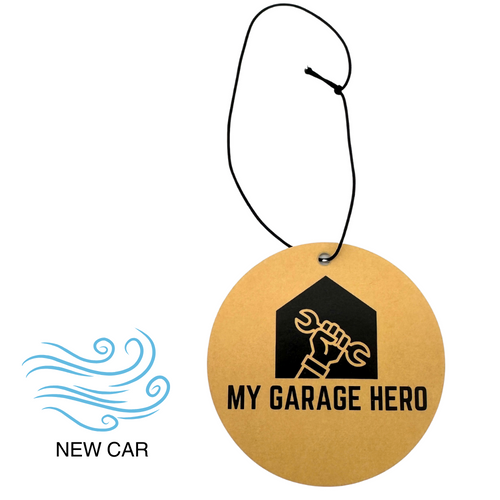 Circular air freshener with my garage hero logo in it on a golden back drop - new car scent 