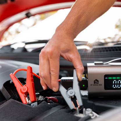 attaching jump leads to car's battery from the boost n inflate 