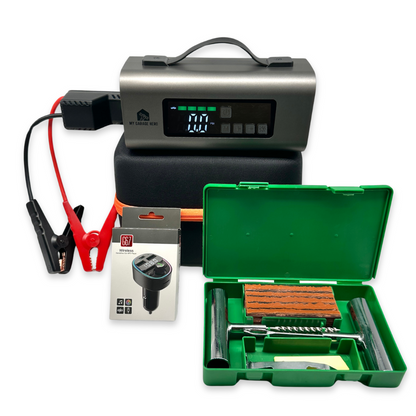 Standard Roadside Rescue Kit displayed in a white studio setup, featuring the Boost N’ Inflate jump starter resting on its carry case, the Bluetooth car charger in packaging, and the green Tyre Repair Kit opened to show the tools and plugs.
