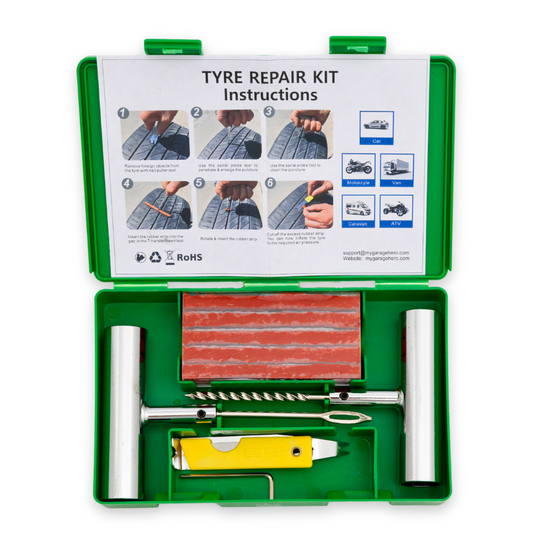 Tyre Repair Kit displayed in a white studio setup, shown opened to reveal the tools, T-handle reamer and plugger, rubber plugs, and printed instructions inside the green hard case.