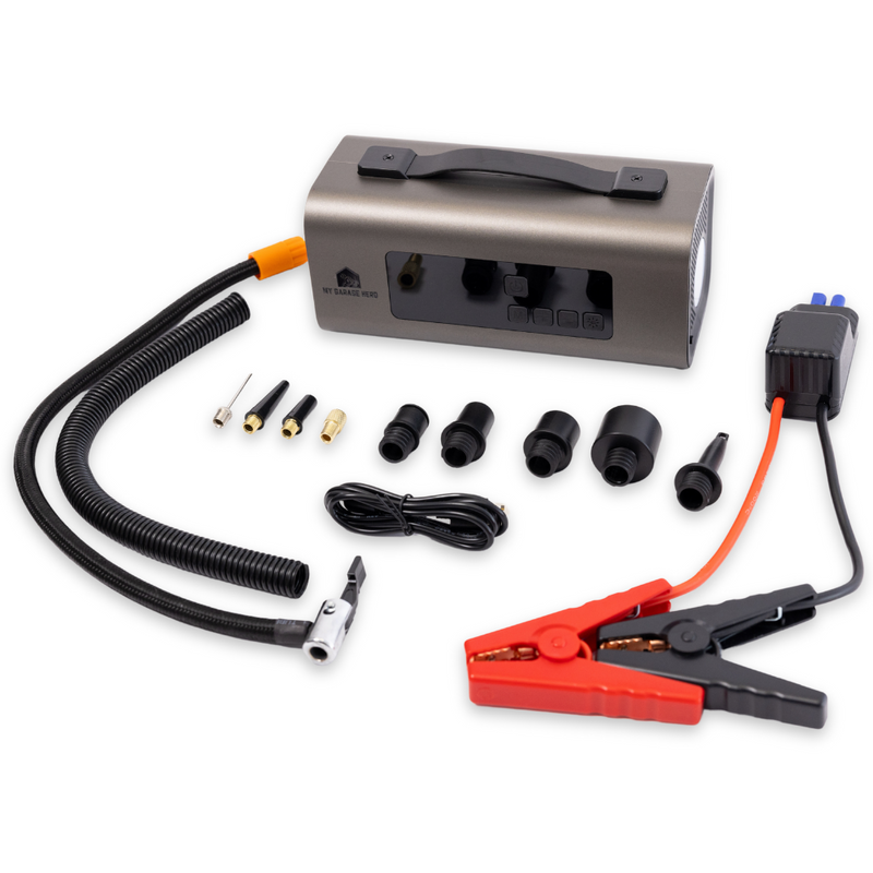 Portable Jump Starter and tyre inflator with all its attactments laying out on a white background. Jumper cables on the left, then the air hose cables on the right, at the back the portable jumpstarter is sitting down label facing forwad and the air hose connections are infront of that 